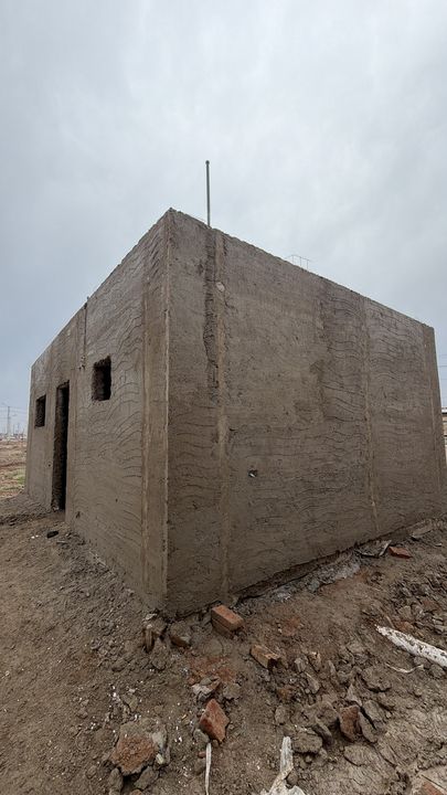 Casa con revoque grueso terminado